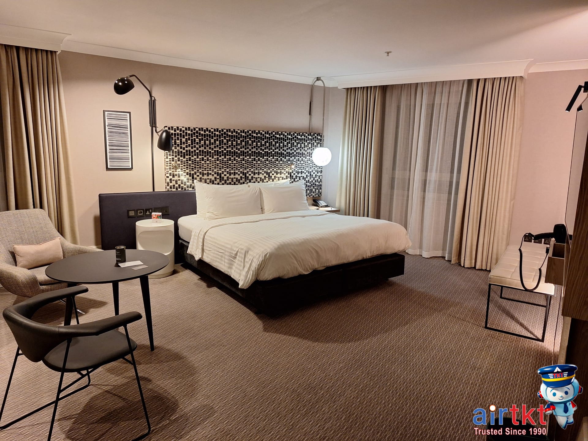 Redeeming Marriott Bonvoy points for luxury hotel room stays.
