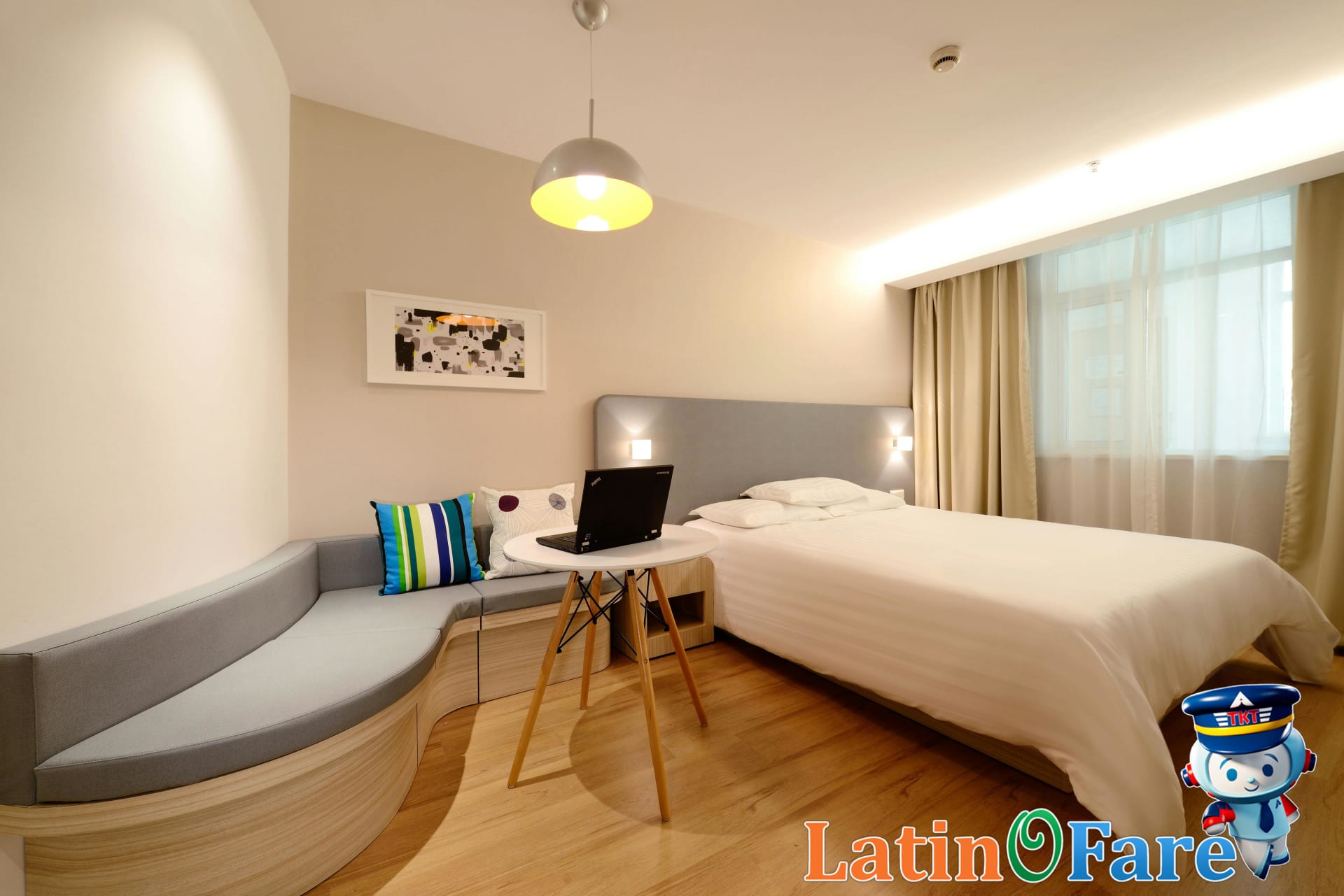 Hotel price comparison on laptop with booking sites for price match guarantee