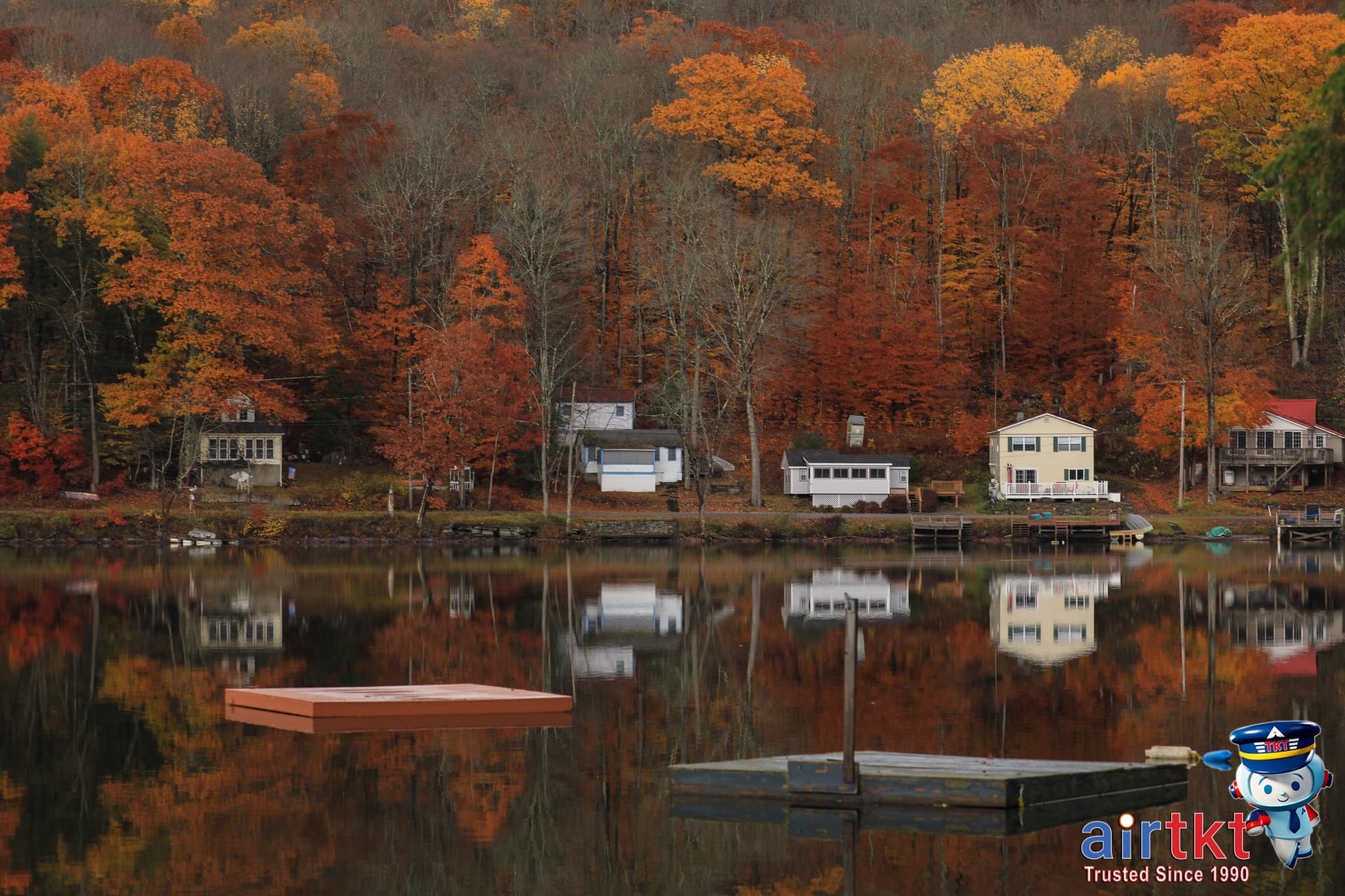 Scenic Catskills mountain range with colorful fall foliage during a clear afternoon