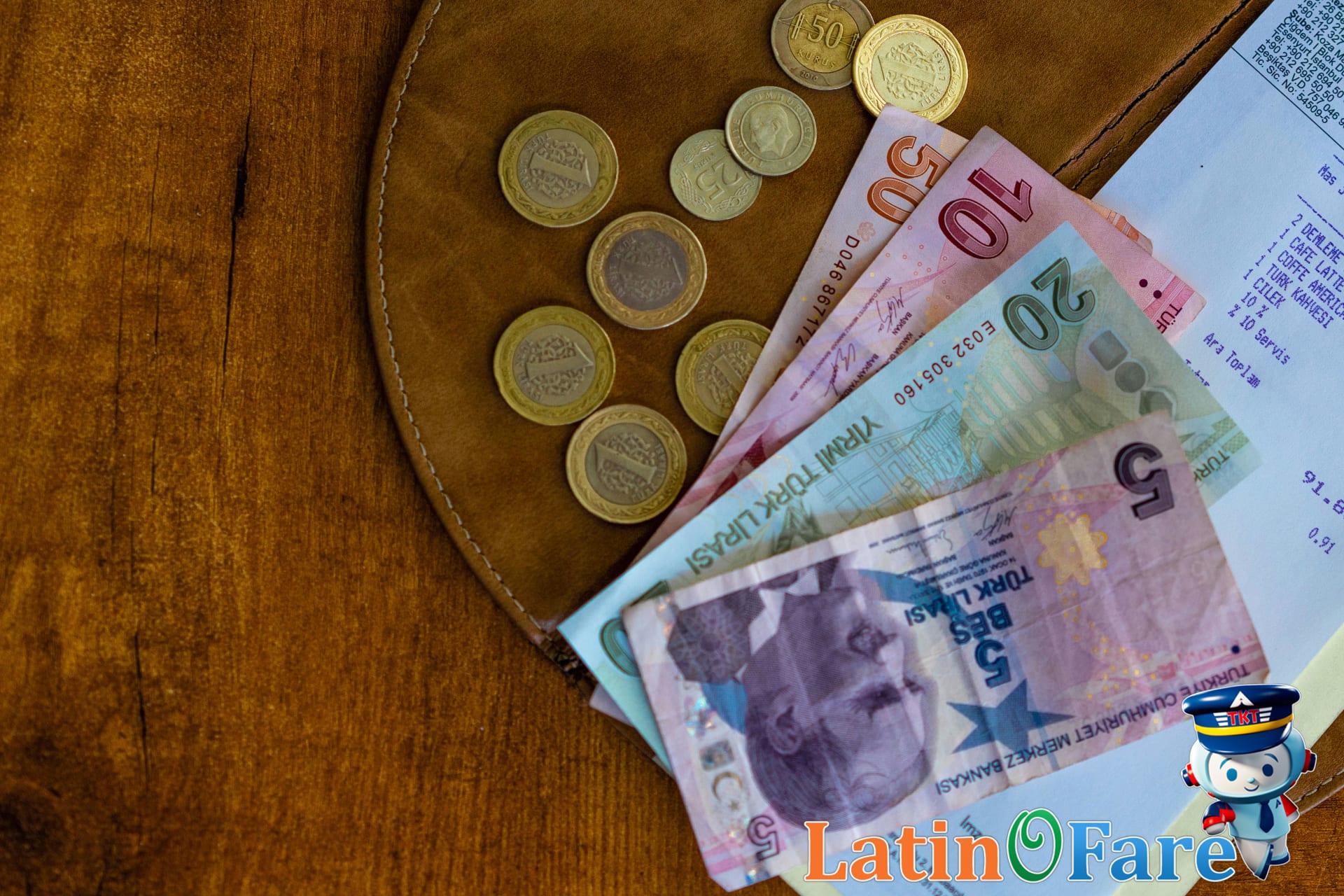 Travelers budgeting for a Bahamas vacation with cash and a beach guidebook reference.