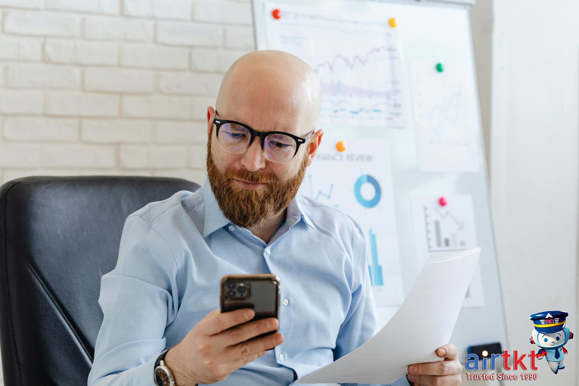 Happy traveler securing airline compensation claim with smartphone and documents