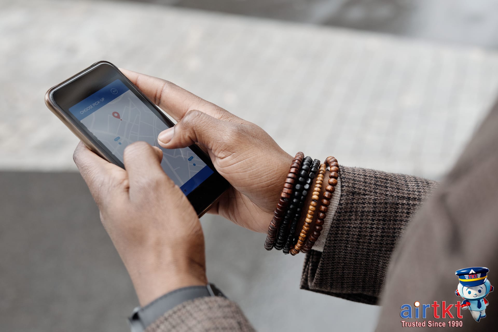 Traveler using map and smartphone in Santiago Chile streets