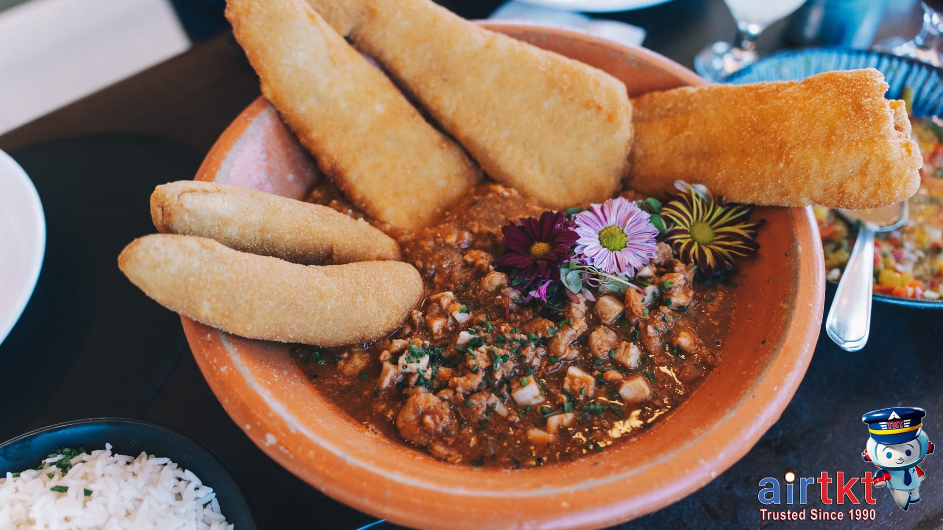Traditional Chilean food served in a Santiago restaurant with local diners enjoying a meal