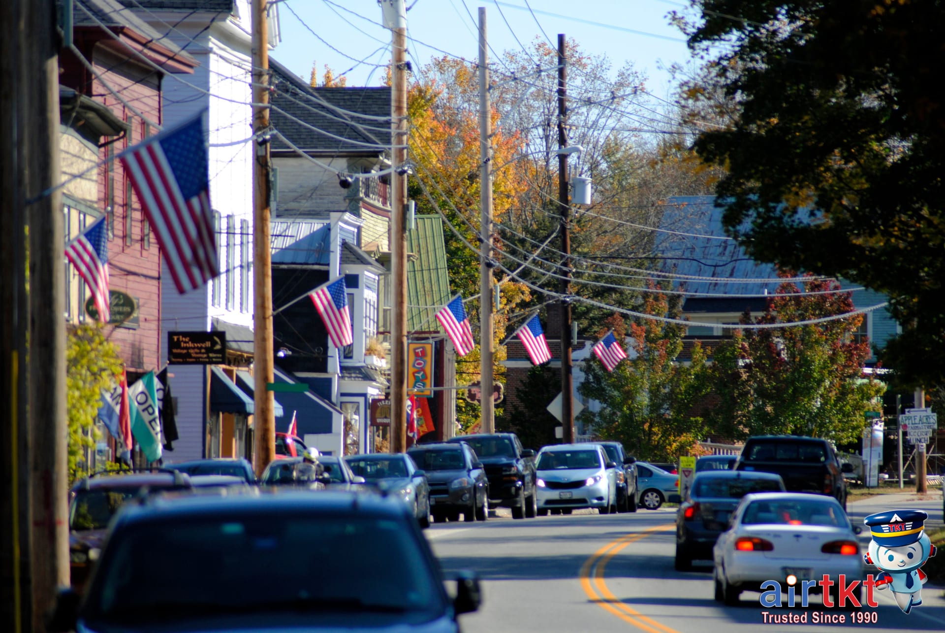 Scenic US road trip with patriotic flags on Flag Day