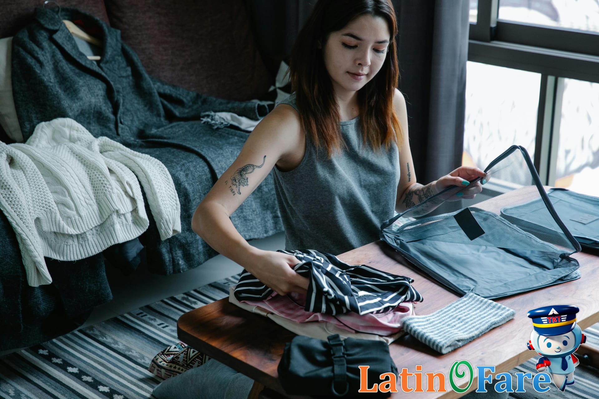 Packing cubes separating clean and dirty clothing in suitcase during an extended trip