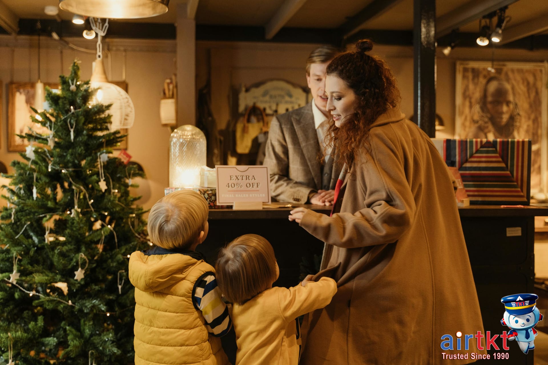 Budget planning for family travel shown in financial graphs and charts on paper