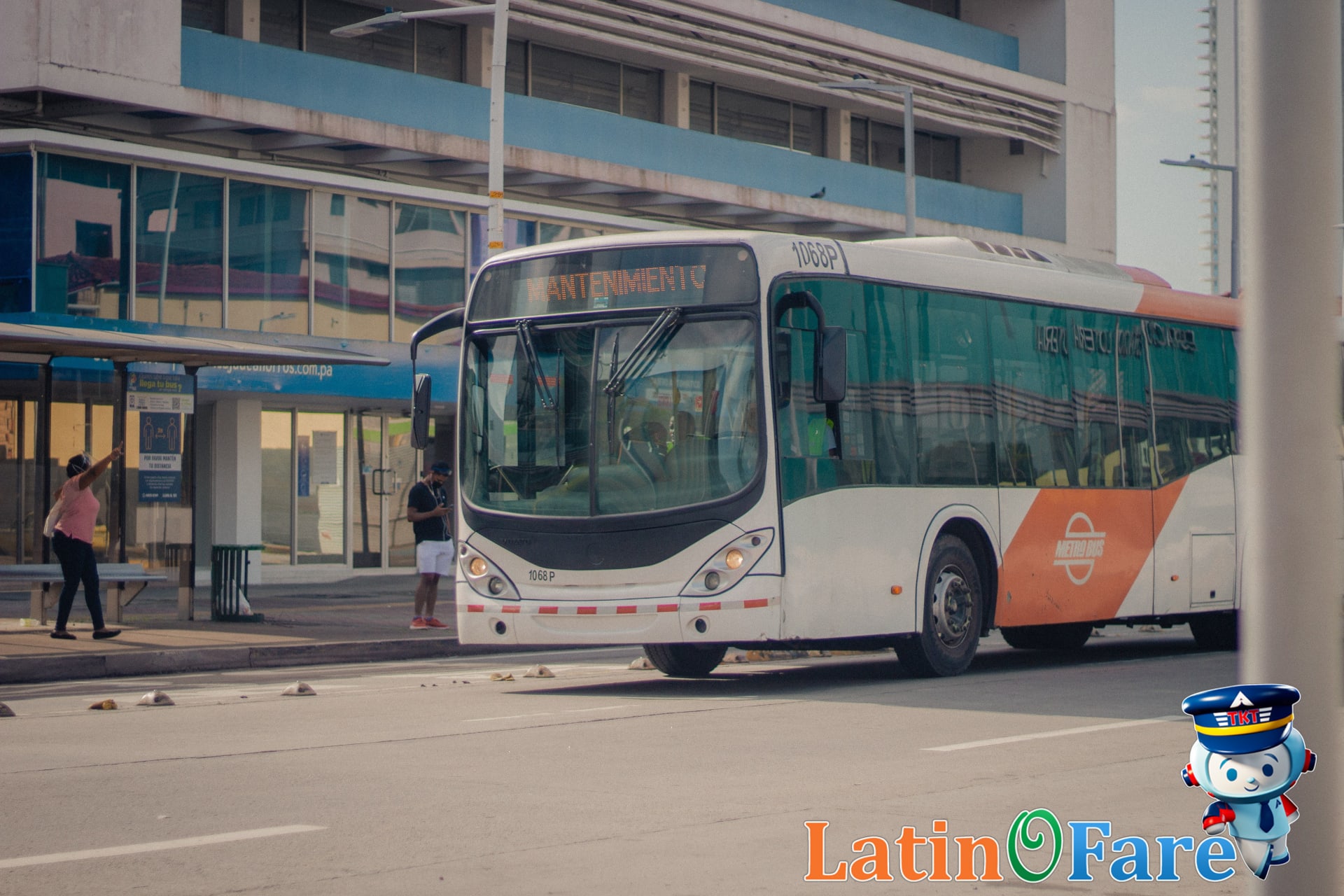 City bus at stop where travelers board, showcasing Quito Ecuador public transportation options