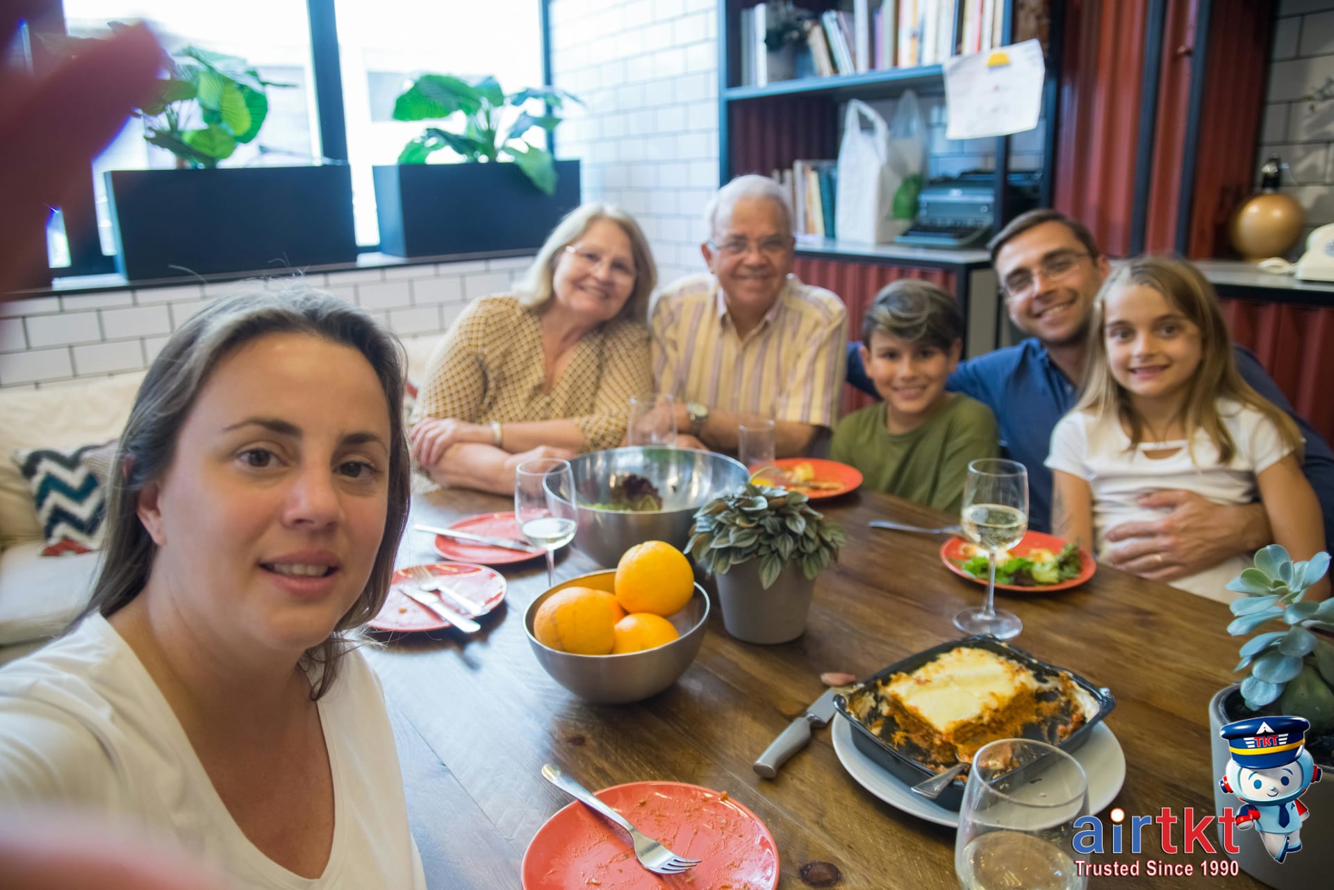 Brazilian dining etiquette with family meal together, people sharing dishes at the table