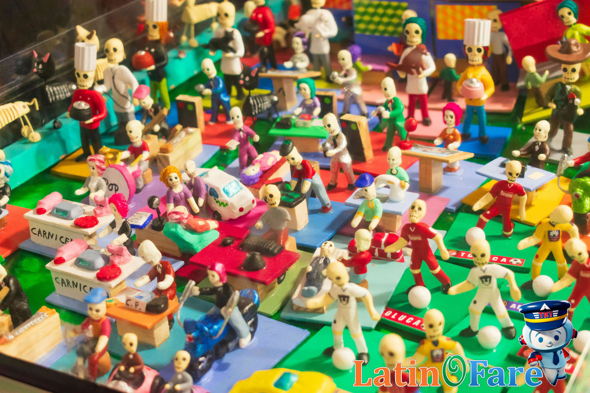 Day of the Dead figurines in a Mexican market during Día de los Muertos celebrations