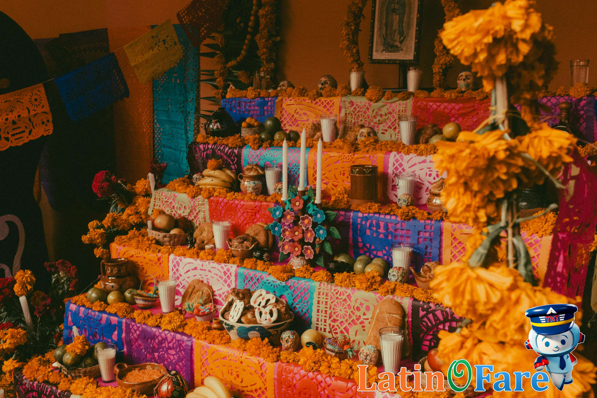 Day of the Dead altar in Mexico City with marigolds, candles, and papel picado for Día de los Muertos