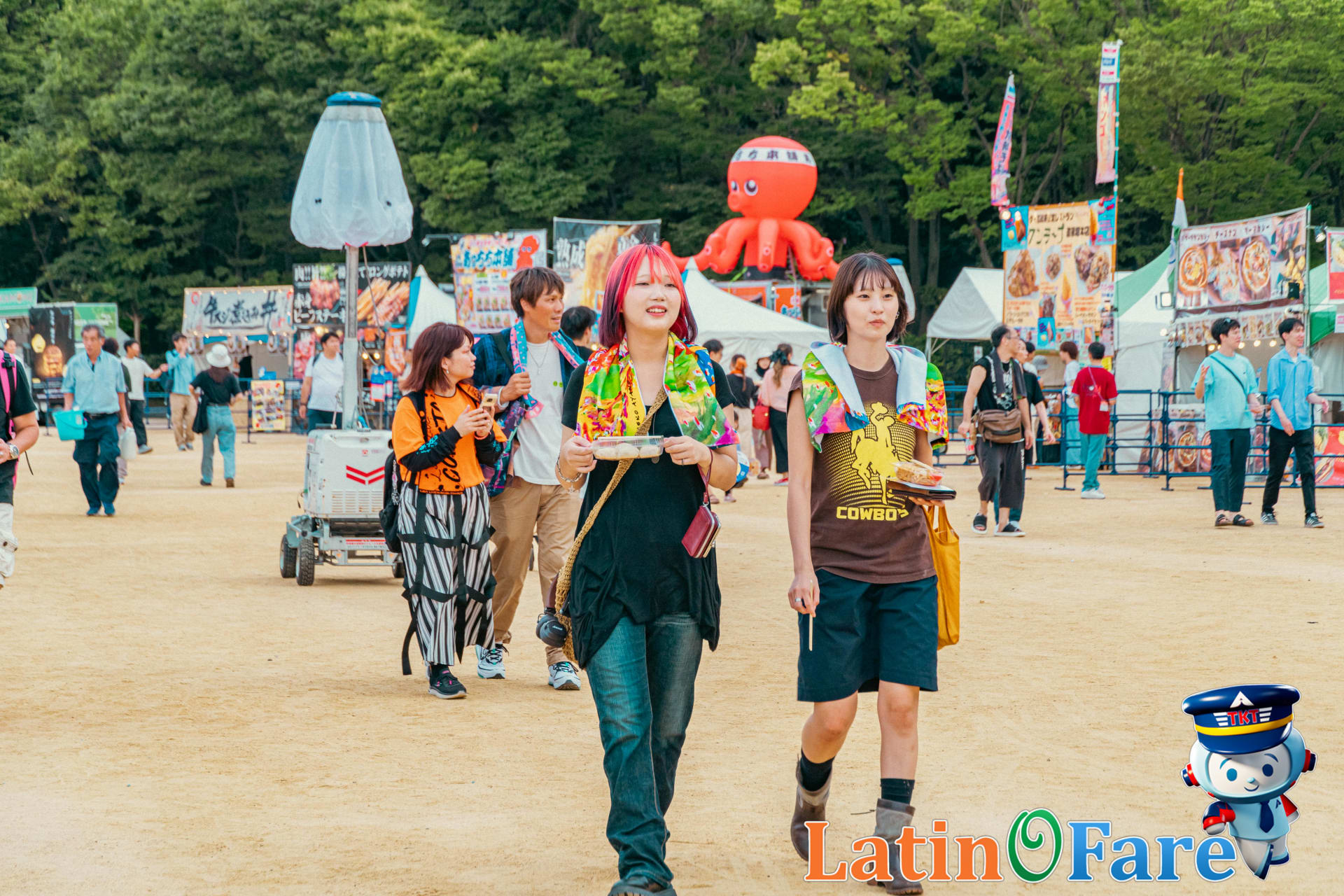 Bonnaroo festival-goers enjoying meals from diverse food vendors at The Farm