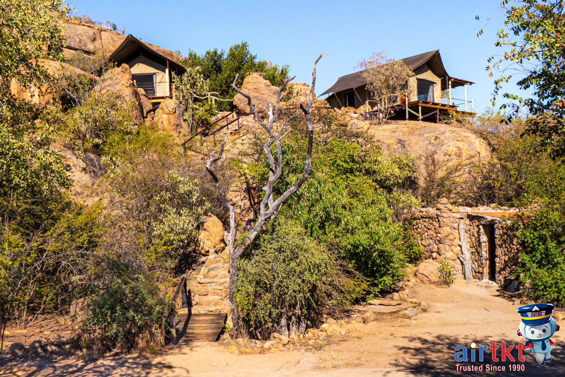 Rustic safari lodges with campfire experience in African dry season safari.