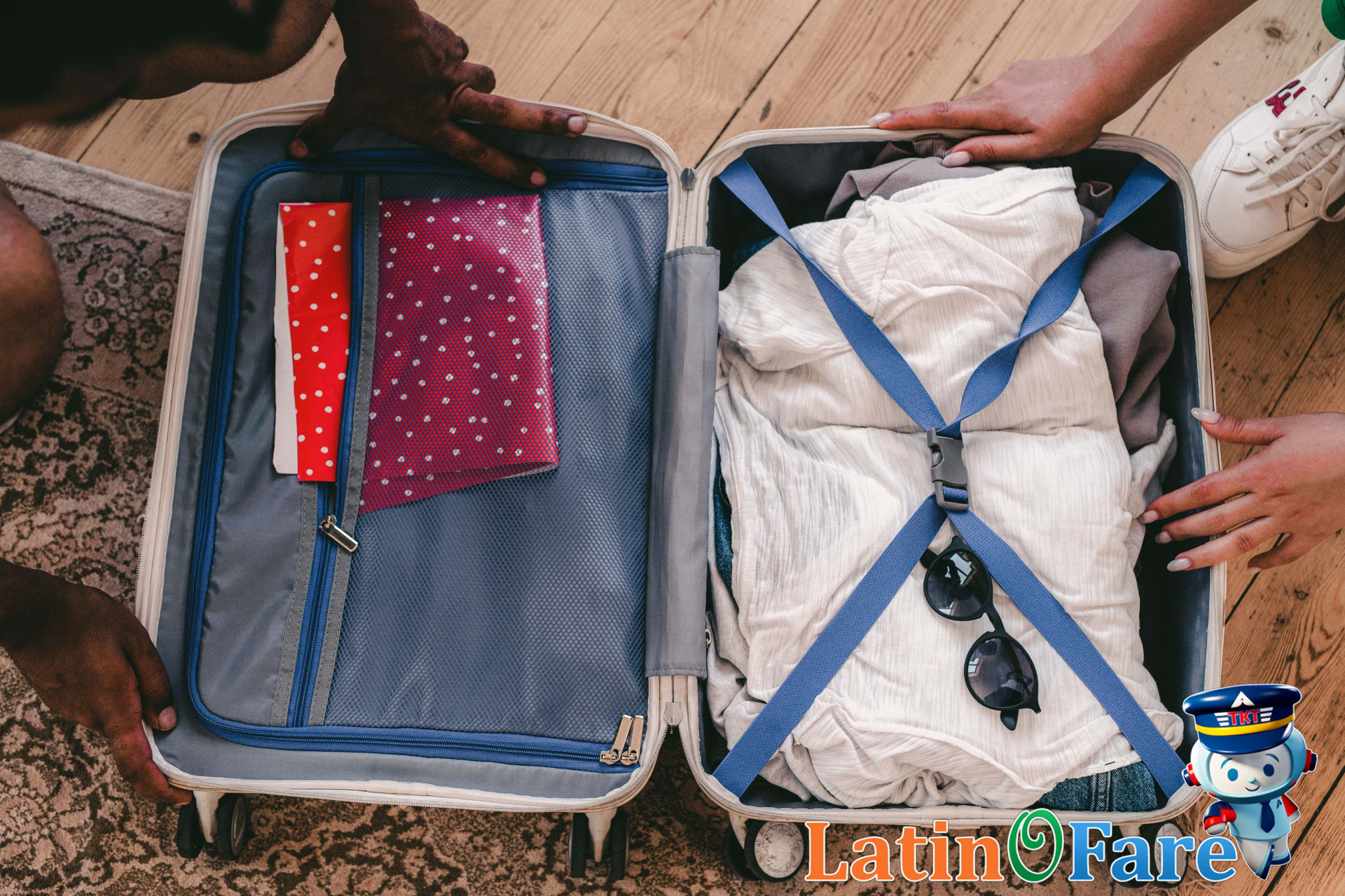 Open suitcase with July 4th travel essentials and patriotic accessories for holiday packing.