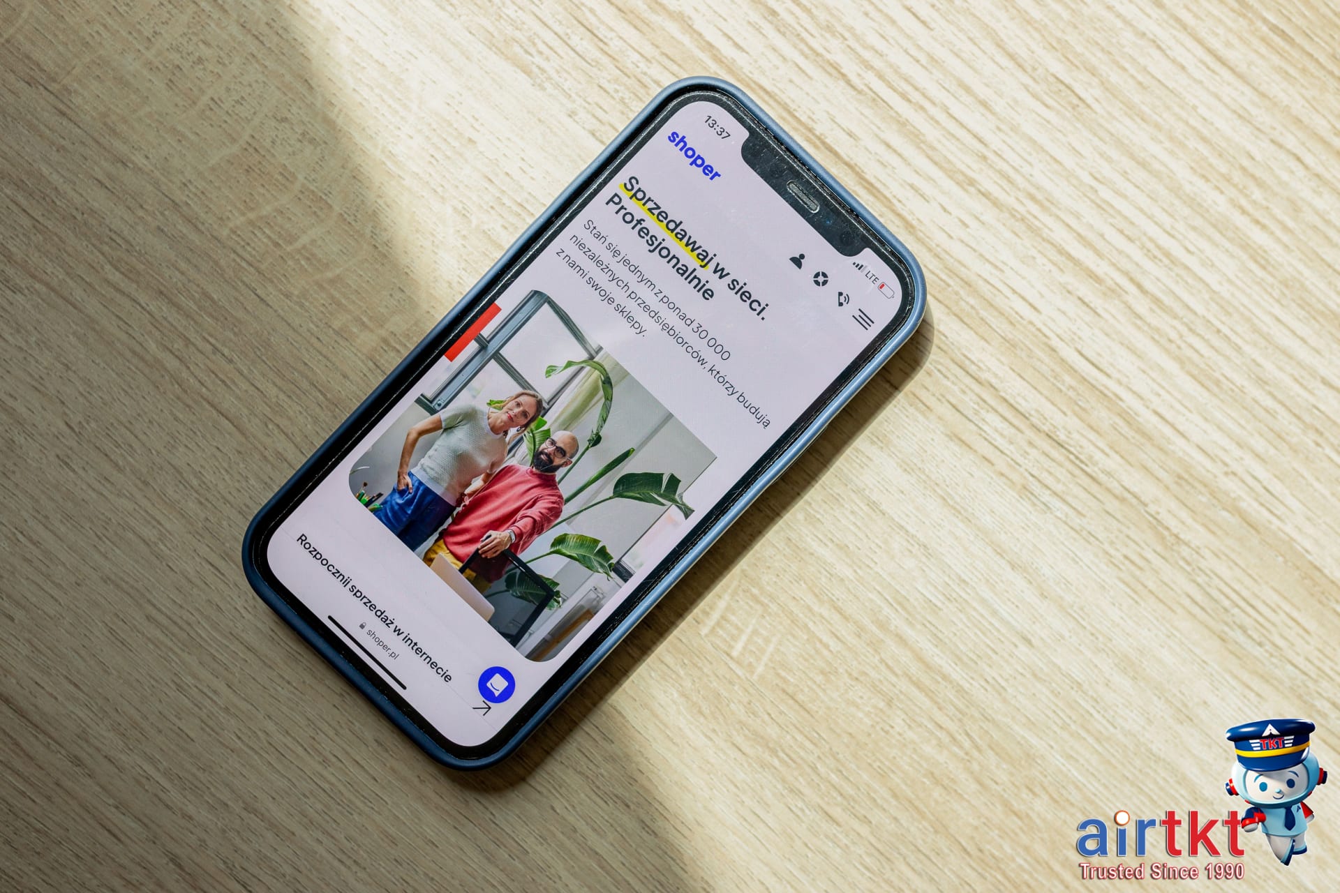 Using AirTkt platform to find Black Friday travel deals on smartphone