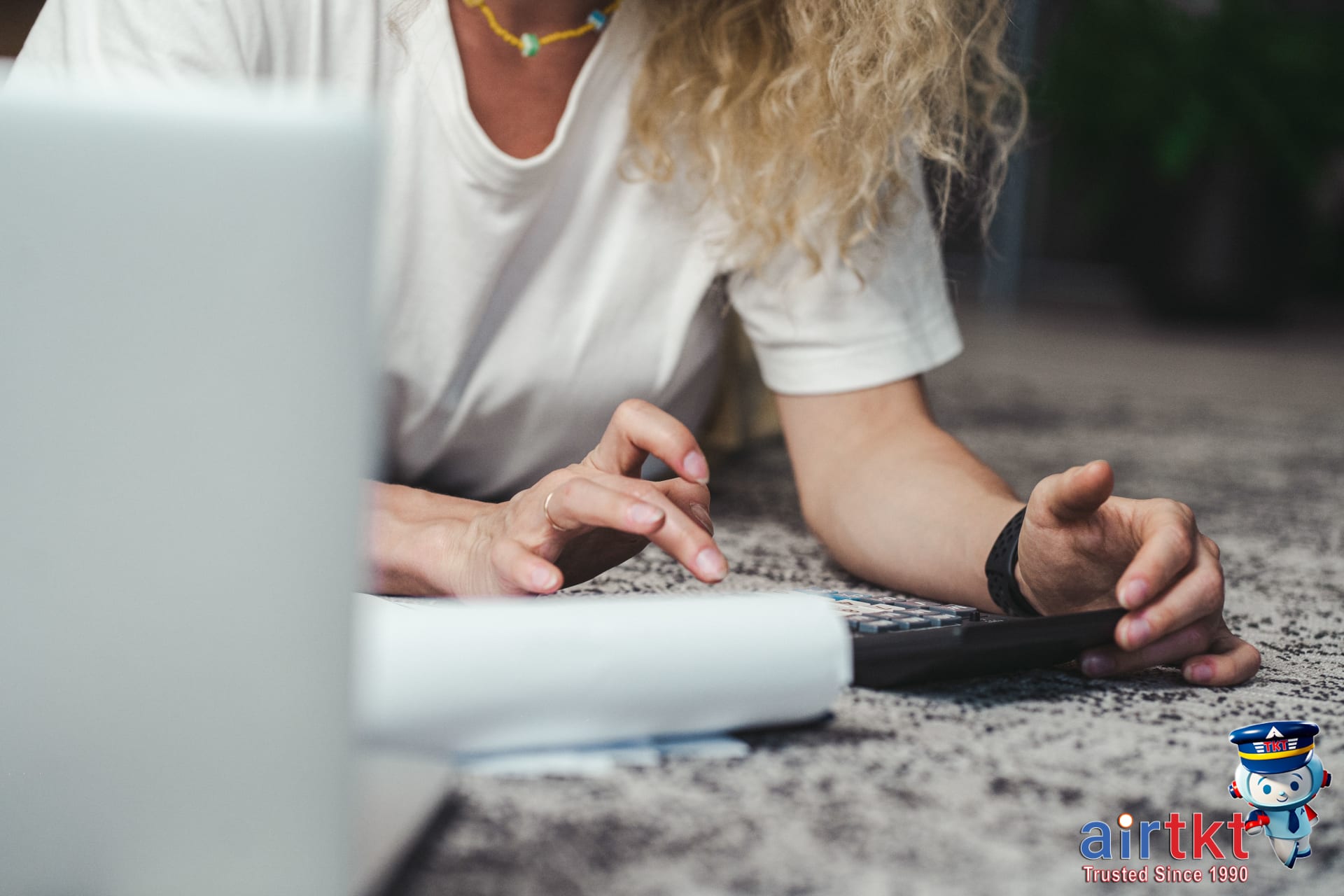 Planning budget for Black Friday travel deals with laptop and calculator