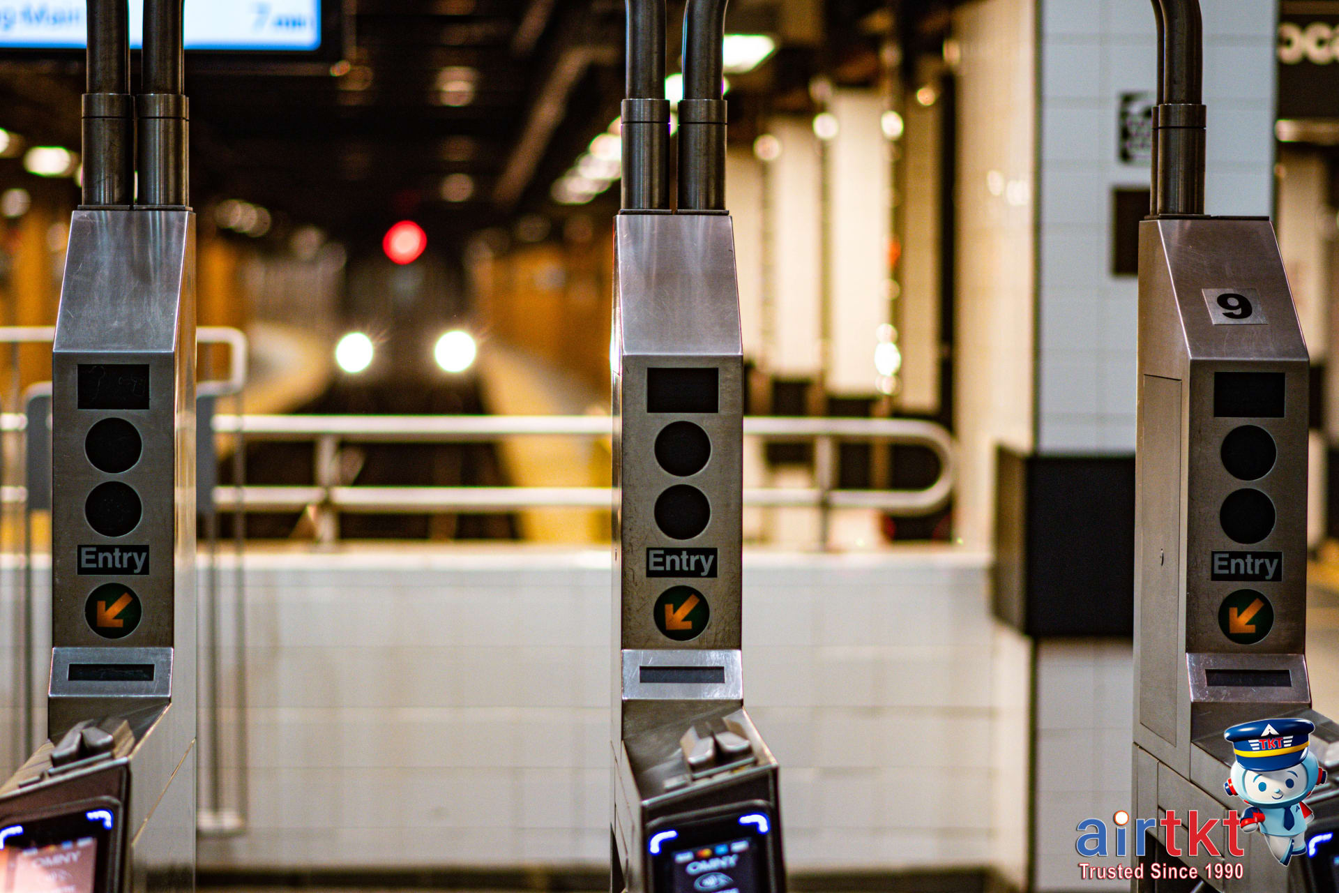Using BTS Skytrain ticket at station turnstile in Bangkok for entry