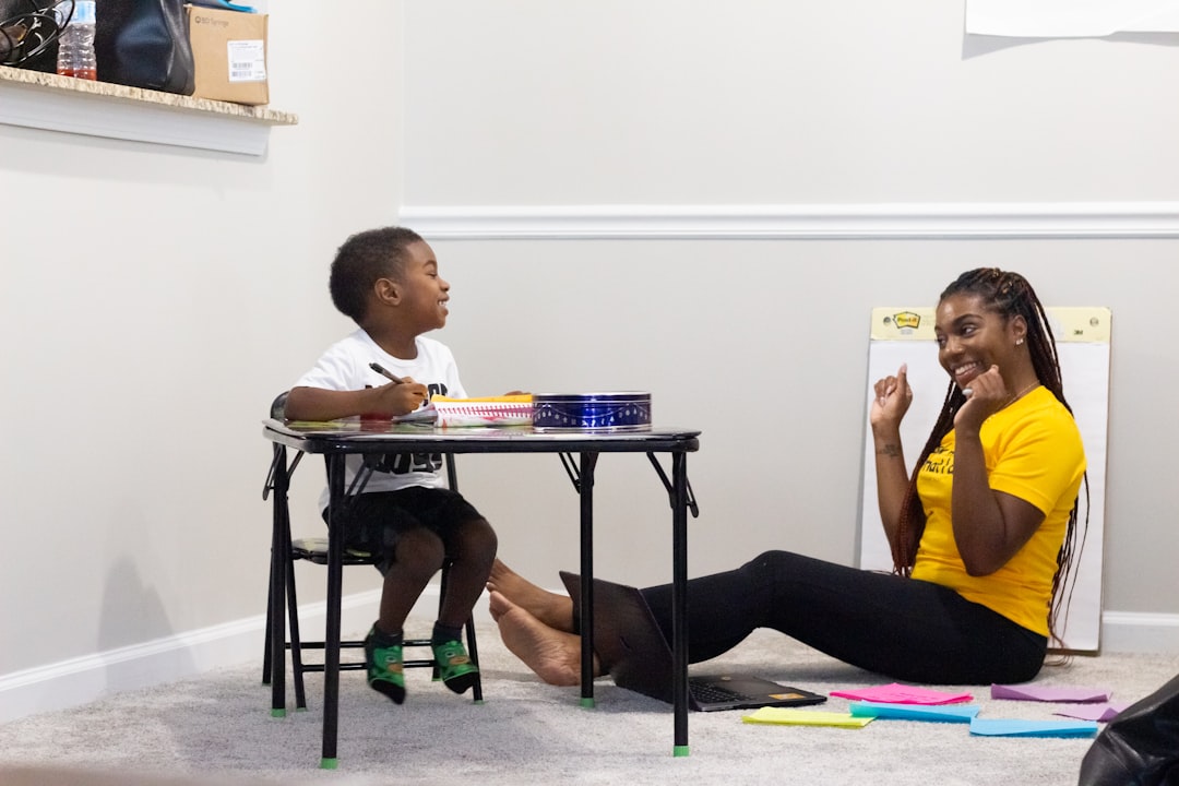 mother playing with child in a bedroom