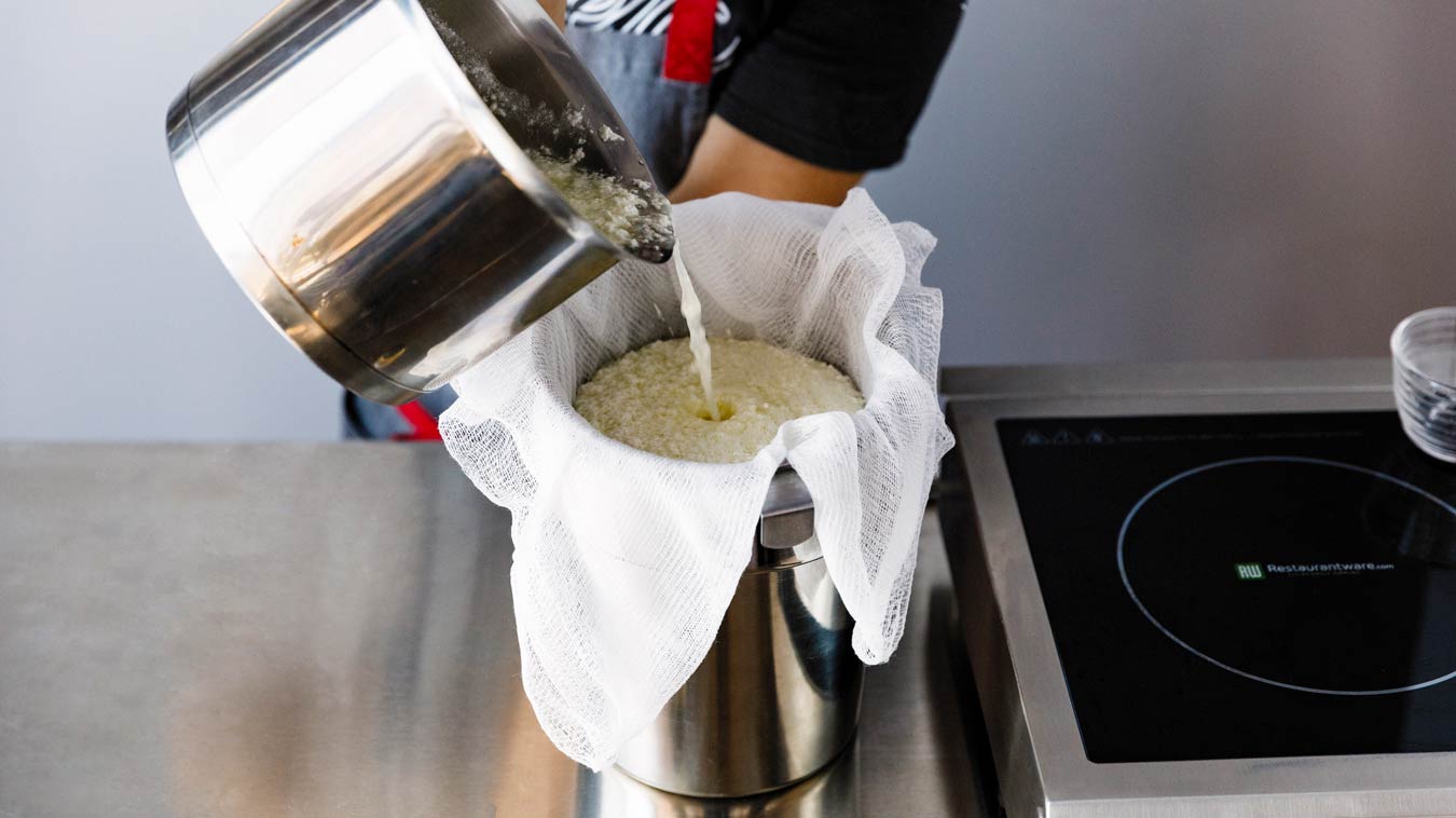 Amoretti Recipe: Homemade Ricotta. Straining fresh ricotta.