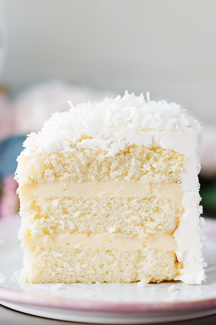 A slice of Amoretti's Coconut Cake Recipe