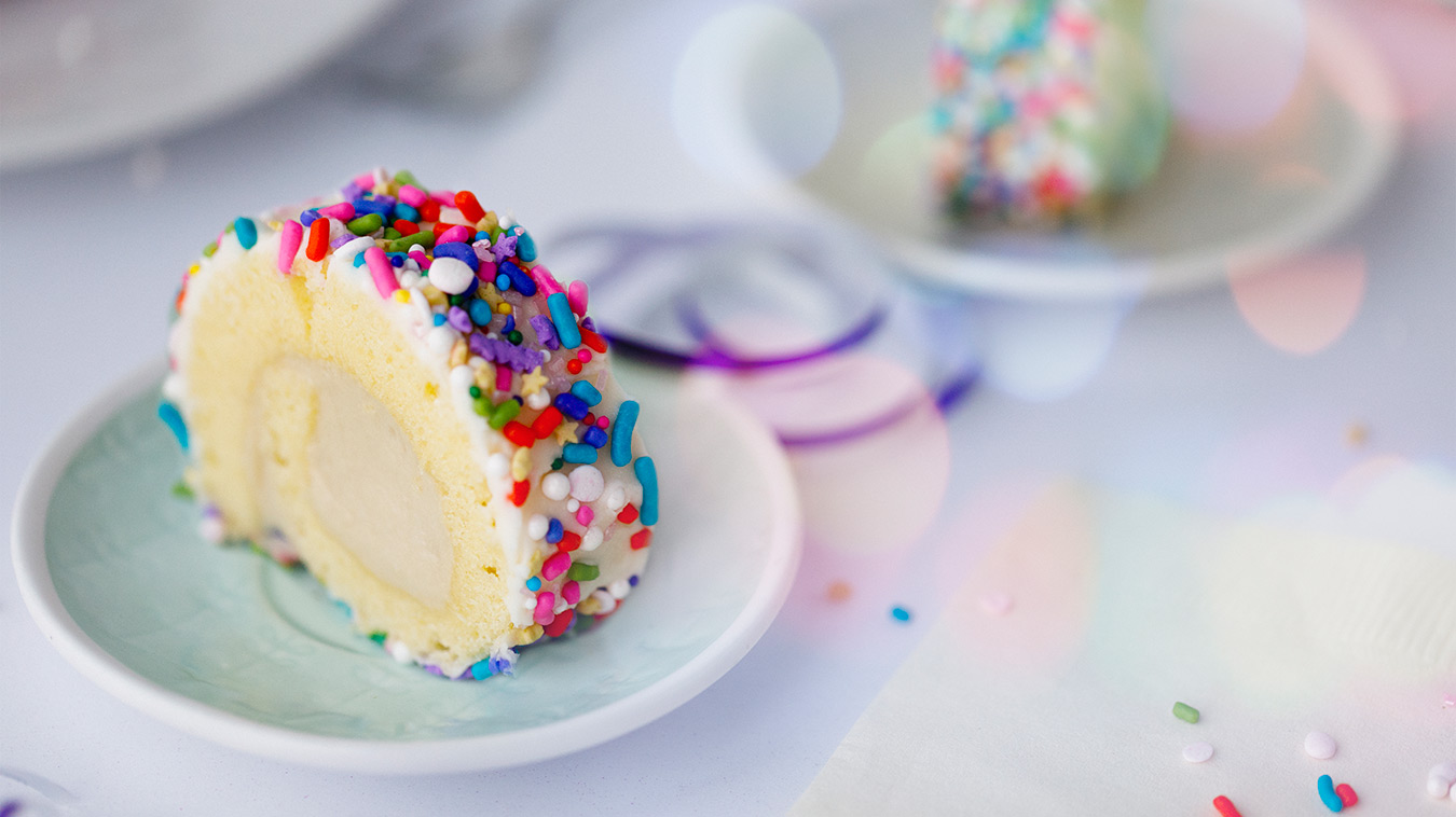 Amoretti Recipe: a slice of Mini Rainbow Roulades with Birthday Cake Filling