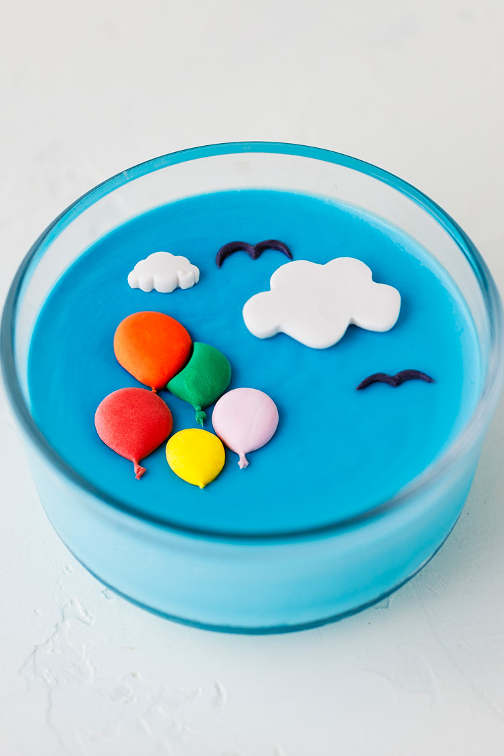 Amoretti Coconut Blue Raspberry Panna Cotta Recipe decorated with balloons
