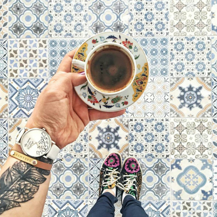 So many things here - that teacup, those shoes, the watch and tattoo, oh, an the tile.