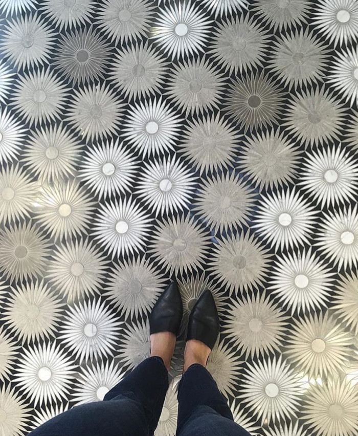 An incredible mosaic floor featuring Artistic Tile