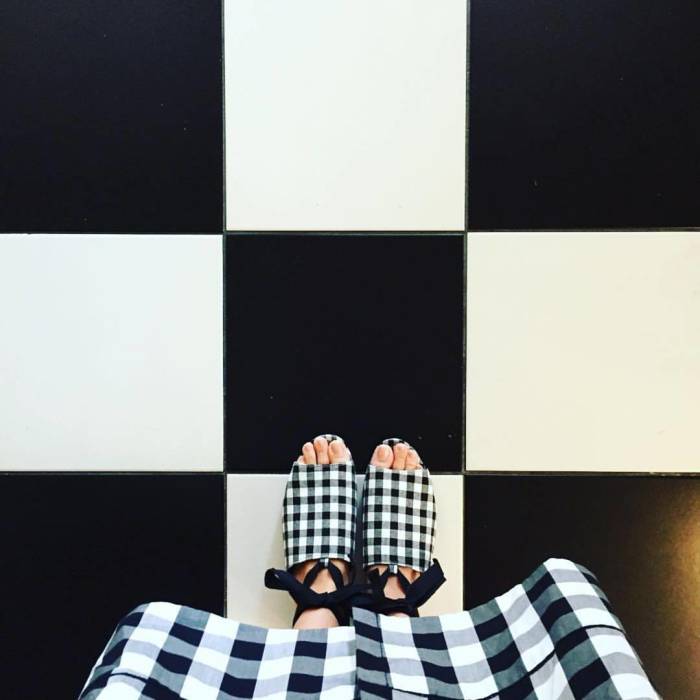 Checkered black and white shoes, dress, tile, oh my!