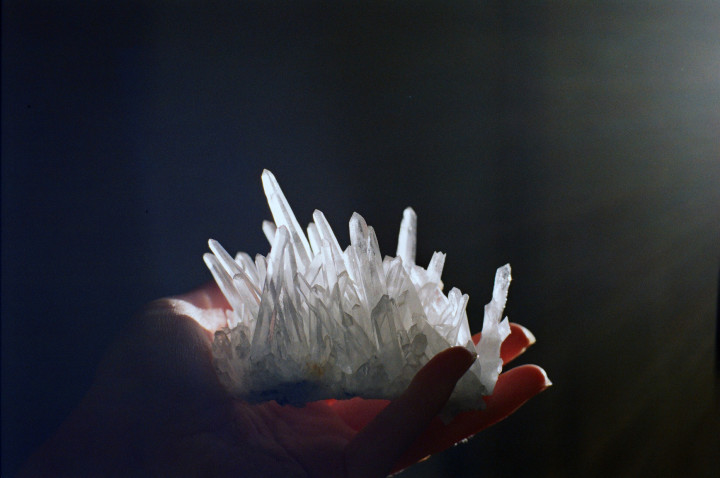 Quartz crystals in hand