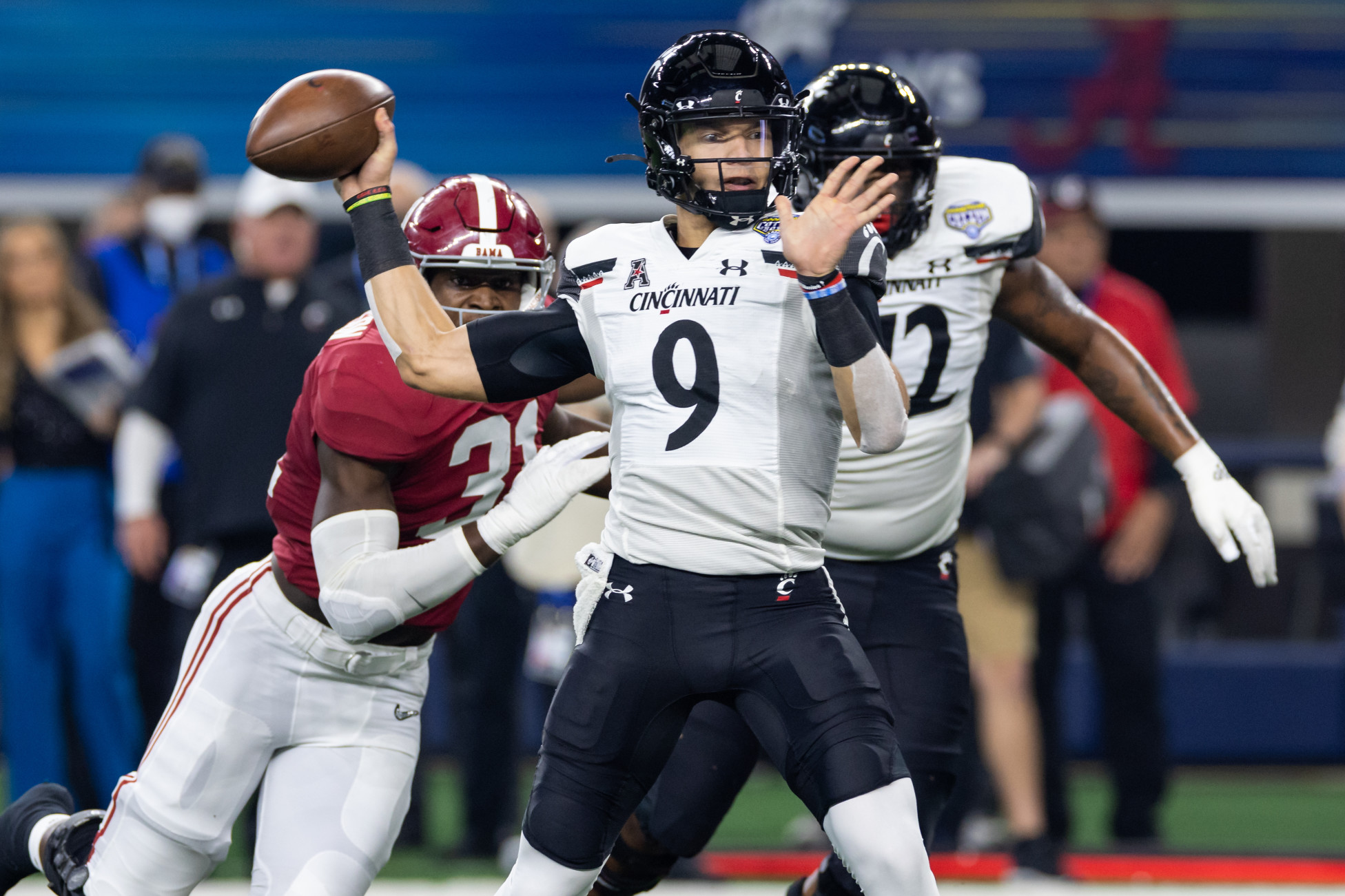 Desmond Ridder of the Cincinnati Bearcats throws the ball during the   Cincinnati bearcats football, Cincinnati bearcats, College football players