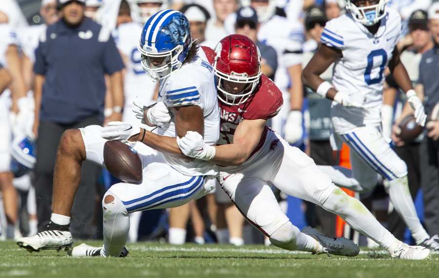 LOOK. Marvin Harrison Jr with an Apple Watch and designer cleats on the  field vs. Wisconsin