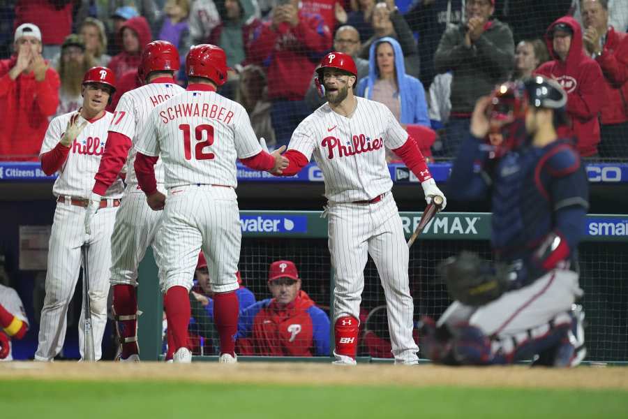 Seattle Mariners' Teoscar Hernandez hits an RBI single off Cleveland  Guardians relief pitcher Nick Sandlin during the 12th inning of a baseball  game, Sunday, April 9, 2023, in Cleveland. (AP Photo/Ron Schwane