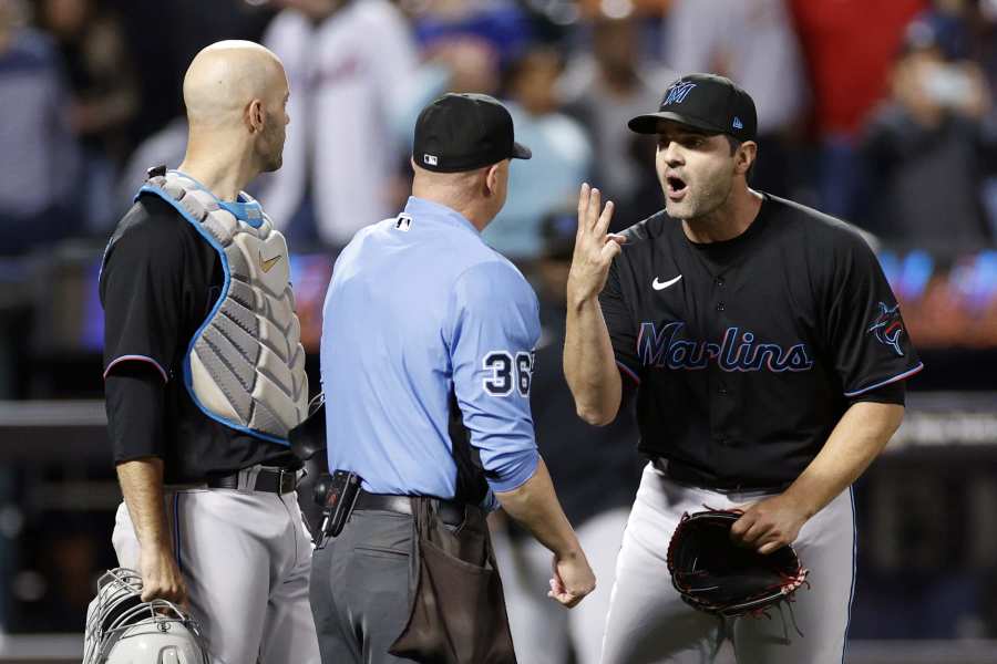 Atlanta Braves Charlie Culberson as a towel held on his face as he is taken  out of the field after getting hit by a ball during the seventh inning of a  baseball