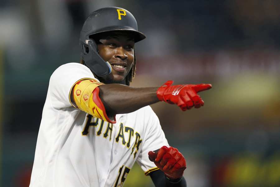 PITTSBURGH, PA - AUGUST 03: Pittsburgh Pirates shortstop Oneil Cruz (15)  reacts after hitting a two-run home run to center field in the seventh  inning of an MLB game against the Milwaukee