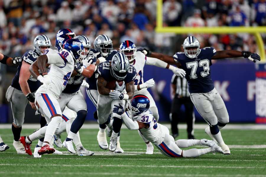 Cowboys running strong with Elliott, Pollard as Texans visit