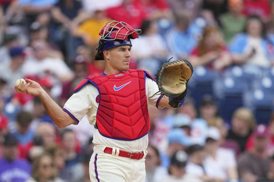 Philadelphia Phillies' Edmundo Sosa, right, scores as Houston Astros  catcher Martin Maldonado stands in front of home plate during the seventh  inning of a baseball game Friday, April 28, 2023, in Houston. (