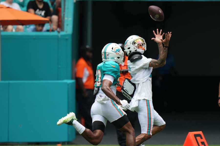 Philadelphia Eagles running back Jason Huntley (32) is tackled by Miami  Dolphins linebacker Duke Riley (45) during the first half of a NFL  preseason football game, Saturday, Aug. 27, 2022, in Miami