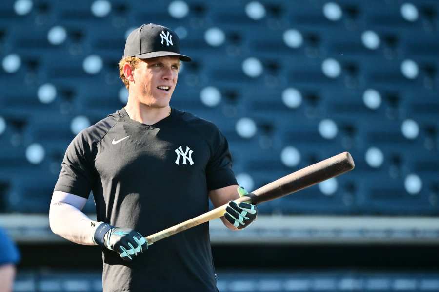 Luis Robert Jr. #88 and Andrew Benintendi of the Chicago White Sox