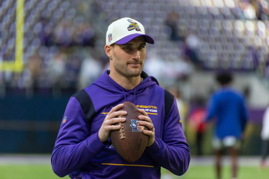 NFL Quarterback Kirk Cousins practices with Estero High players