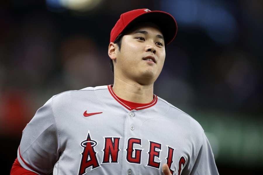 Shohei Ohtani of the Los Angeles Angels receives the American League Rookie  of the Month for April award trophy before the Major League Baseball game  against the Minnesota Twins at Angel Stadium