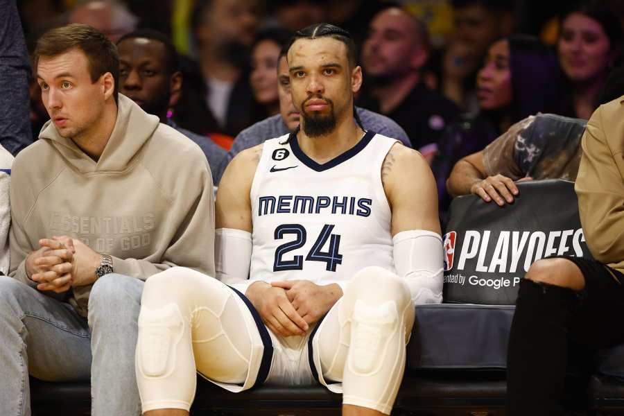 Dillon Brooks stands around awkwardly when Kyrie Irving refuses to take his  jersey