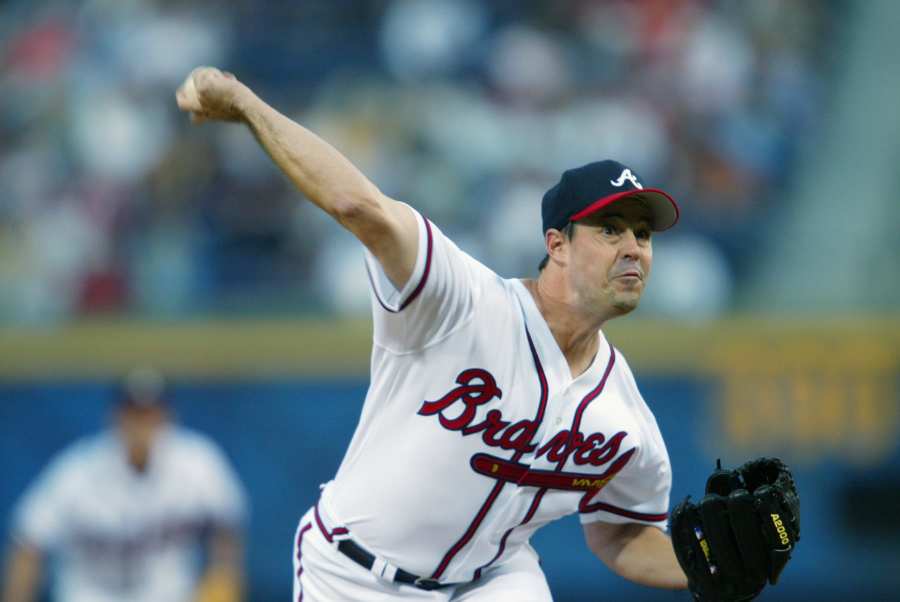 Former Atlanta Braves player David Justice, right, hugs Braves third  baseman Chipper Jones after Justice was inducted into the Braves Hall of  Fame before the Braves' baseball game against the Arizona Diamondbacks