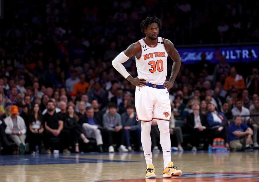 Bob McAdoo of the Miami Heat stands on the court before the game  New  york knicks, American airlines arena, National basketball association