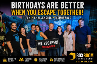 Friends celebrating a birthday party after completing an escape room challenge at Boxroom Escape Games in Hollywood Florida