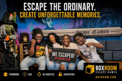 Friends celebrating after escaping a themed escape room at Boxroom Escape Games in Hollywood Florida