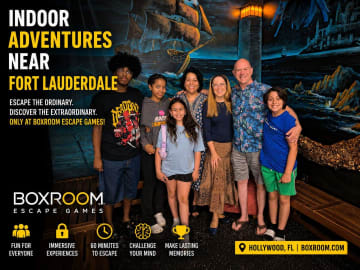 Family enjoying an indoor escape room adventure near Fort Lauderdale at Boxroom Escape Games