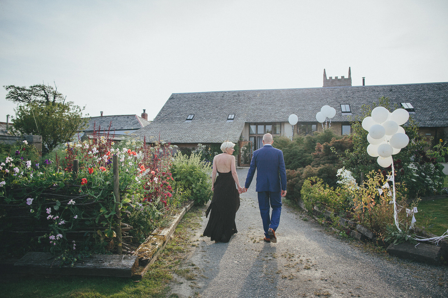 South West | Devon | Hittisleigh | Spring | Boho | DIY | Outdoor | White | Orange | Barn | Real Wedding | Helen Lisk Photography #Bridebook #RealWedding #WeddingIdeas Bridebook.co.uk 