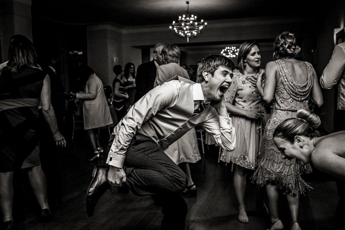Bridebook.co.uk- best man having fun dancing