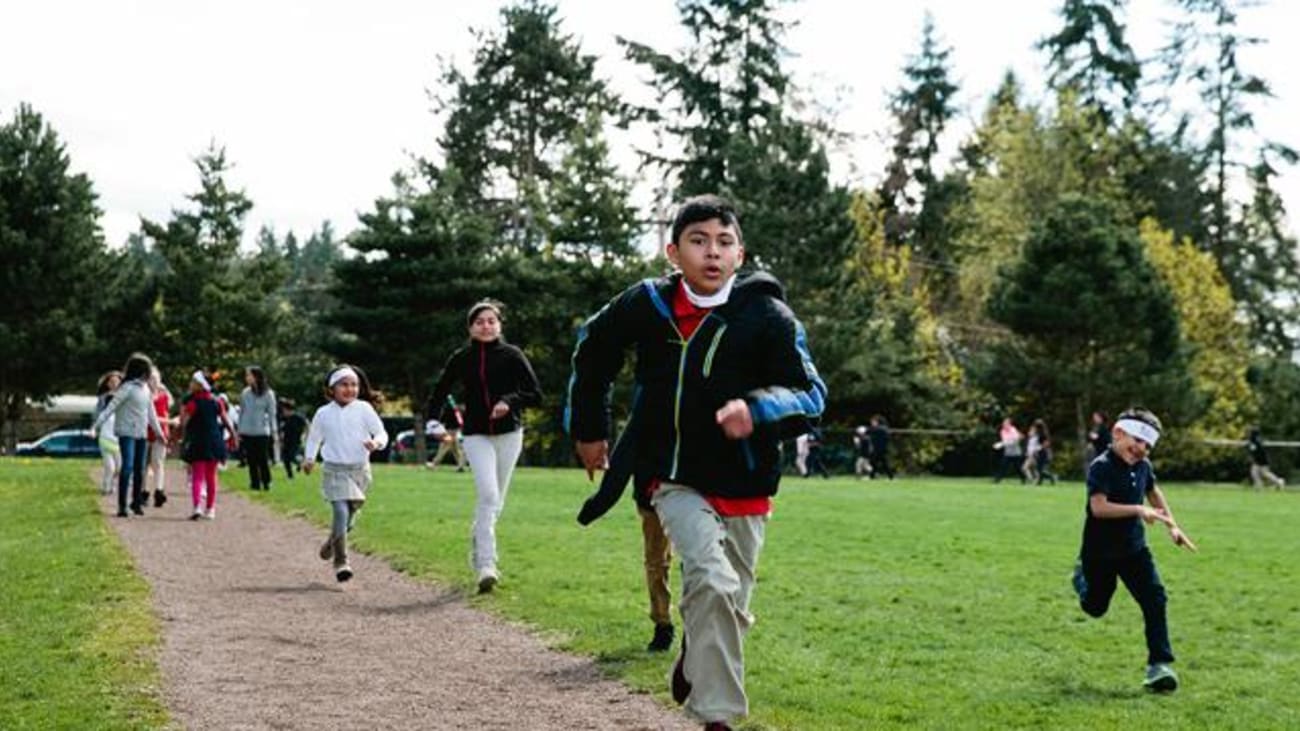 Children run at Madrona Elementary School in SeaTac, Washington. -Bailey Gordon for UW Medicine
