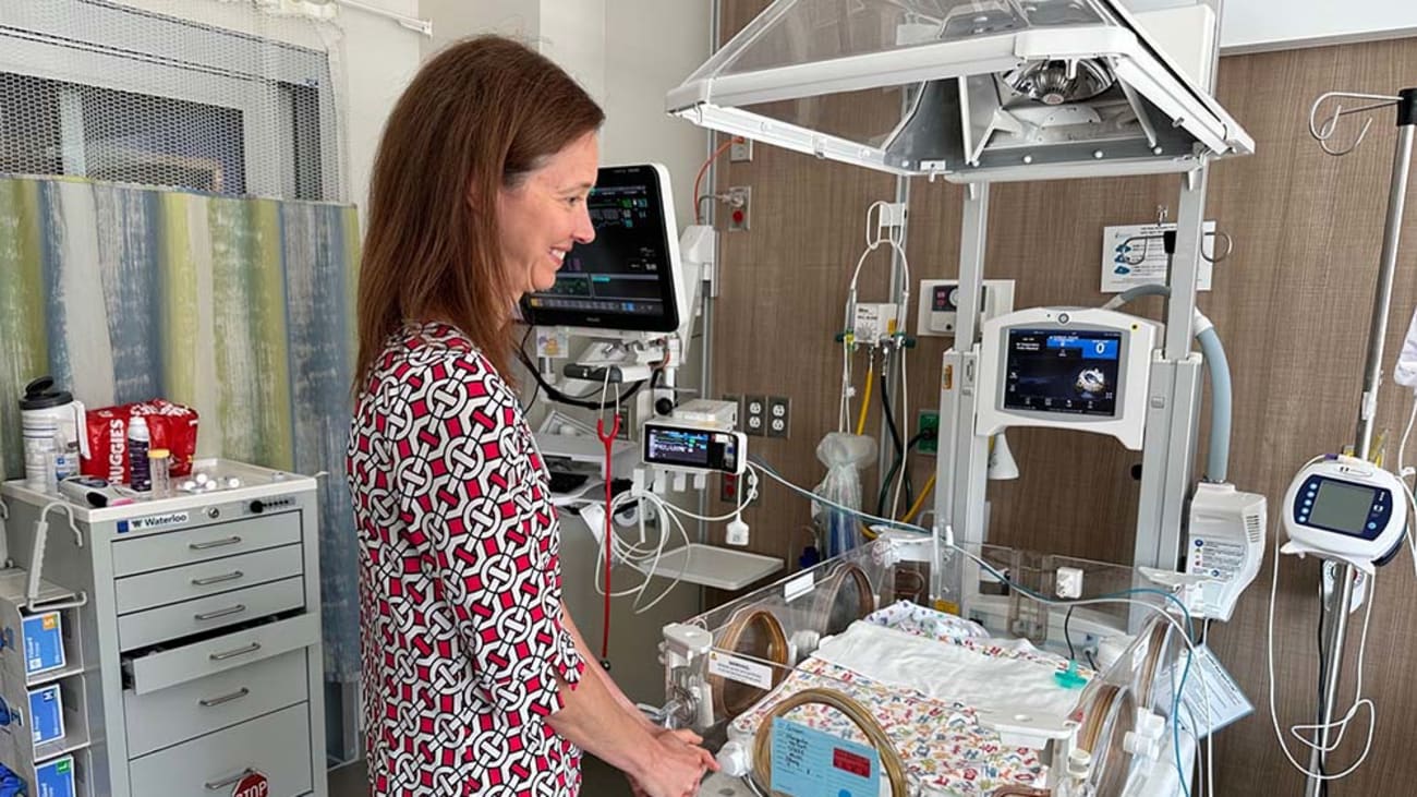 Dr. Julie Ross visits a baby's room in the MUSC Shawn Jenkins Children's Hospital. Photo by Carter Coyle